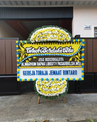 Papan Bunga Duka di Mulyajaya